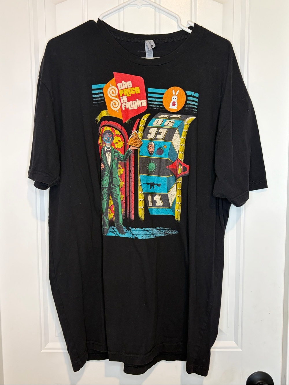 Next Level Apparel Black Tee with Multicolor Retro Game Graphic